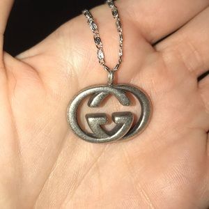 Silver Gucci pendant